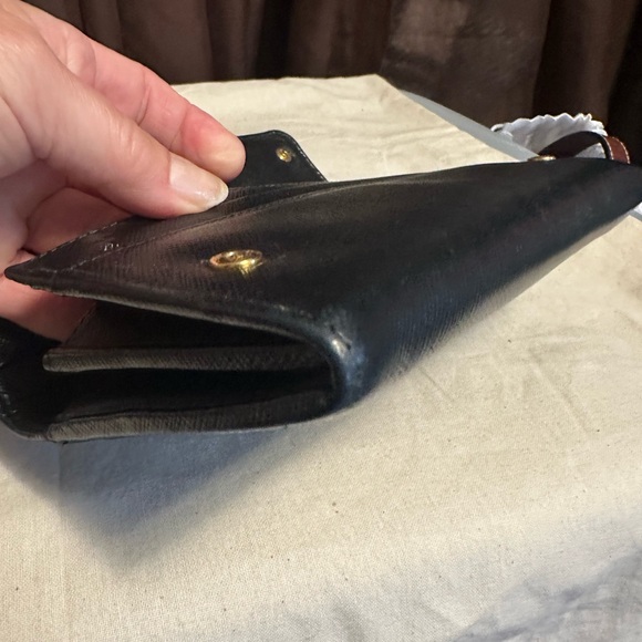 Prada wallet 7.5 x 3.5 black in excellent condition. Absolutely beautiful. - Picture 7 of 9